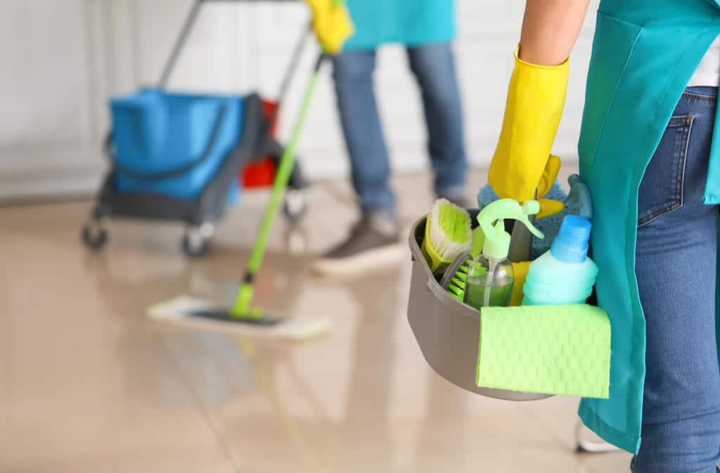 Female,Janitor,With,Cleaning,Supplies,In,Kitchen, Strata Cleaning Services