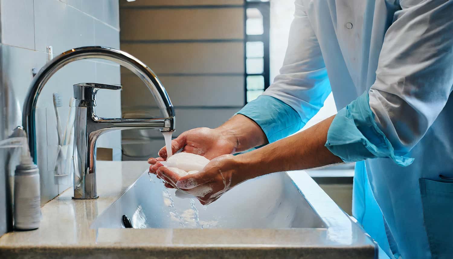 Person cleaning their hands