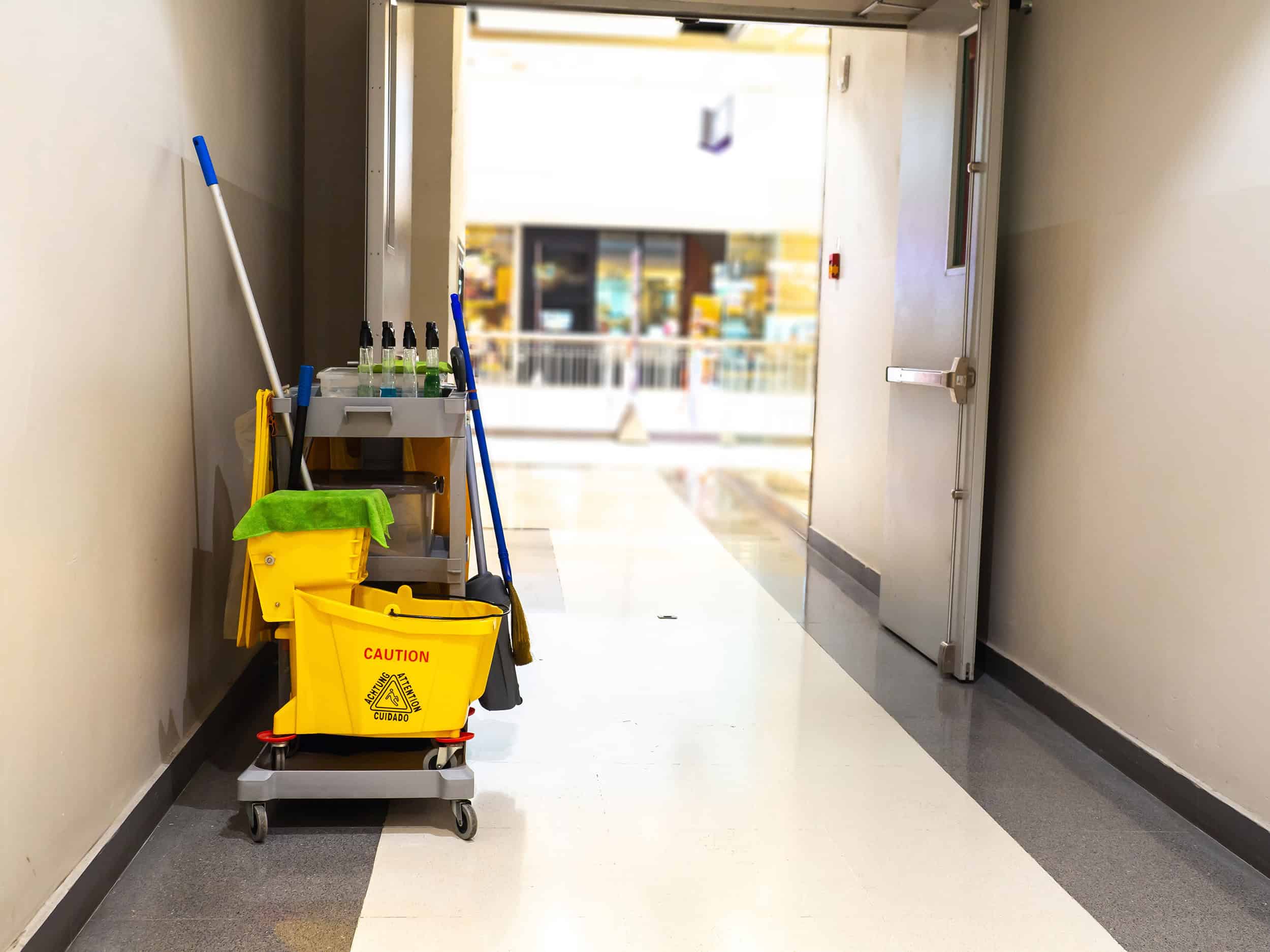 Cleaning equipment set to the side in a shopping centre hallway