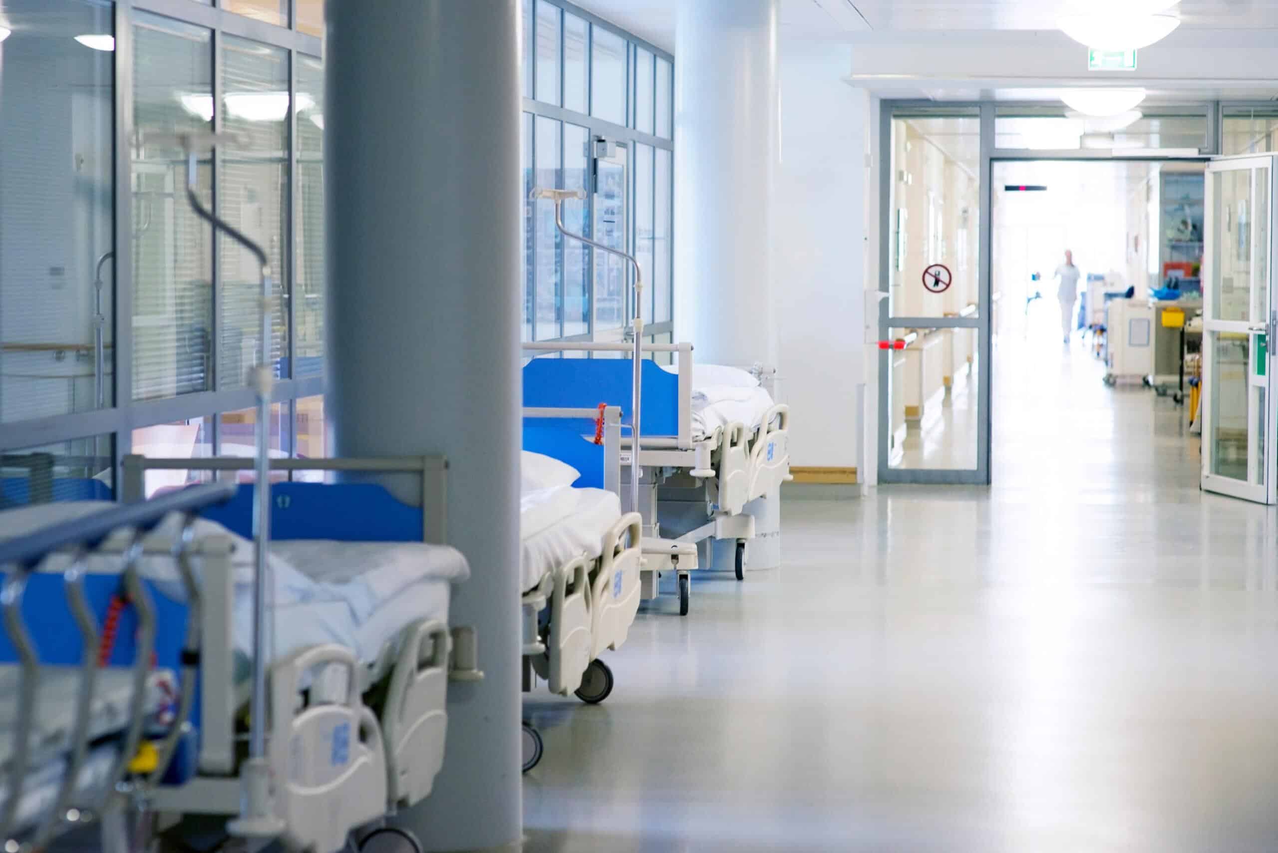 Hospital corridor with beds to the side