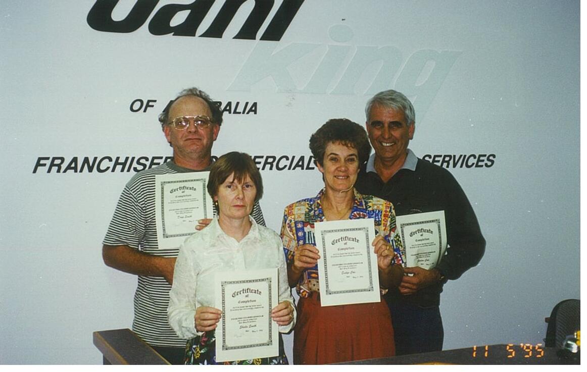 A photo of a group of Jani King's members when Melbourne Regional Office established.